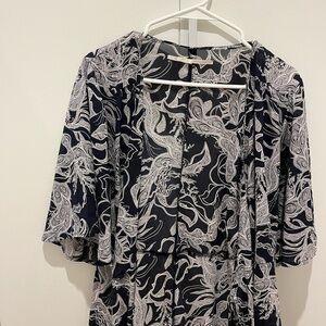 Blue and White Patterned wrap dress slight sheer